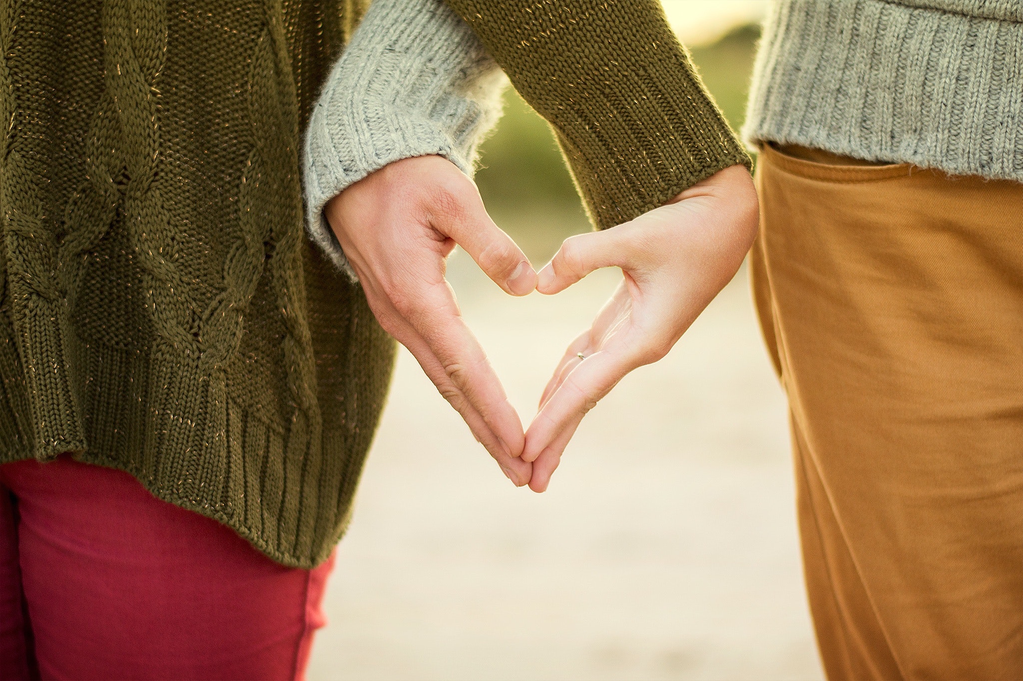 Making a heart with your hands