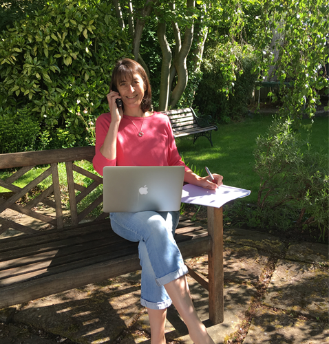 A Ross Good Neighbours volunteer answering a call in her garden