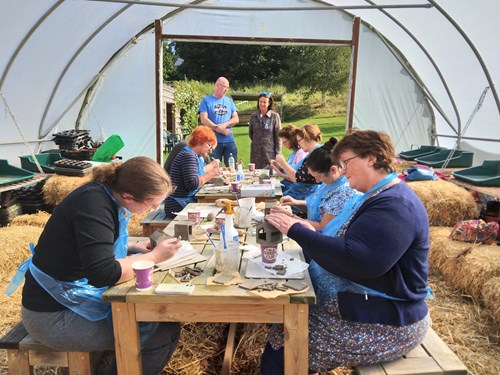 Jo Hilditch, High Sheriff of Herefordshire, met service users and volunteers during a visit to Ross-on-Wye Community Garden