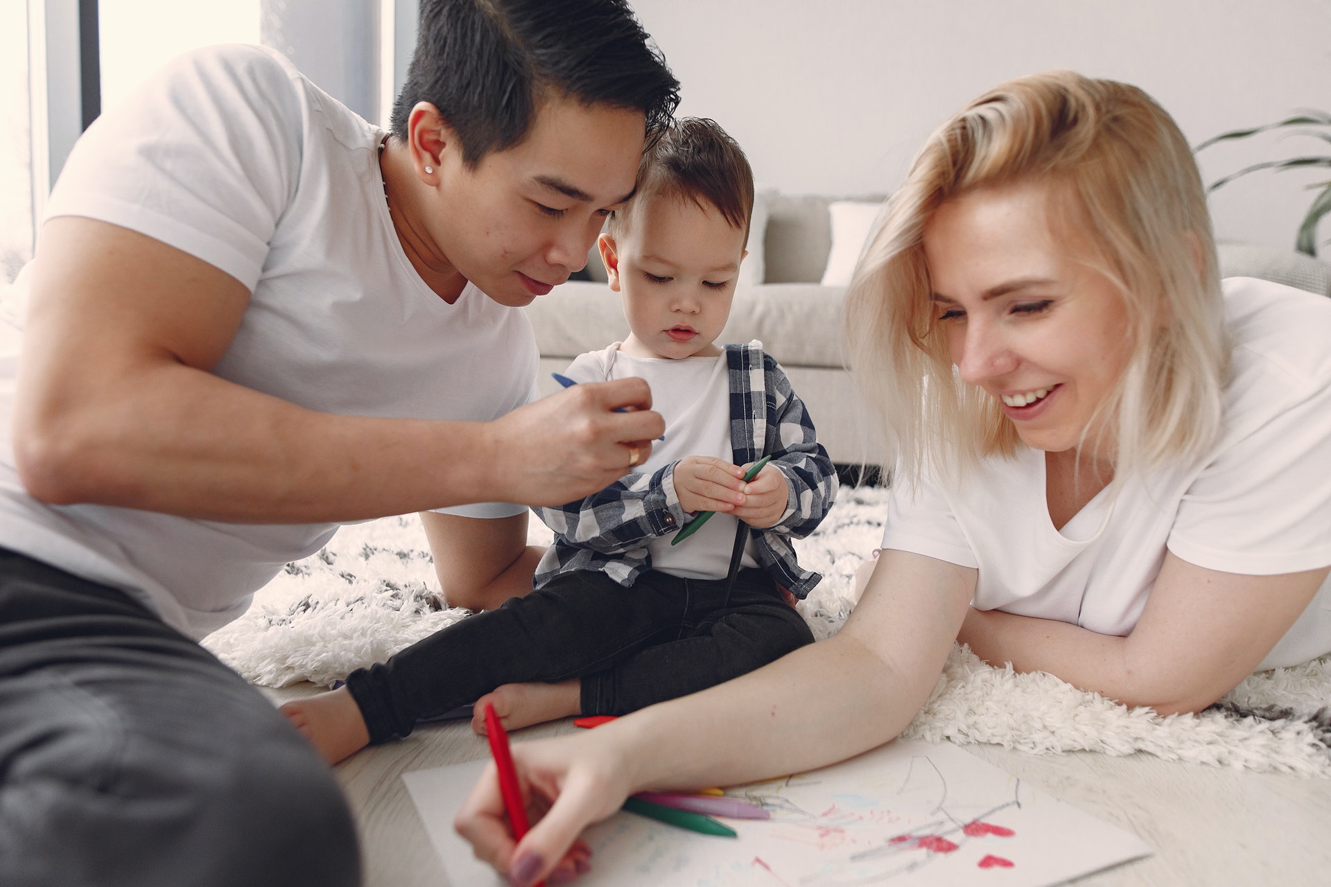 A family drawing a picture together